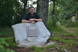 Taking a quick picture behind the monument on top of Sassafras Mountain