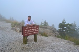 Standing at the monument on the top of Mount Mitchell.  It was a good, damp, cloudy day.