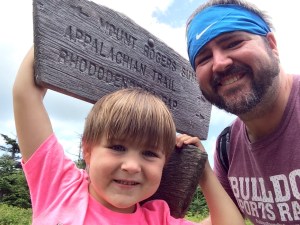 Benjamin and I standing next to the sign pointing out the final route to the Mt. Rogers Summit.  (Mt. Rogers Photo Album)